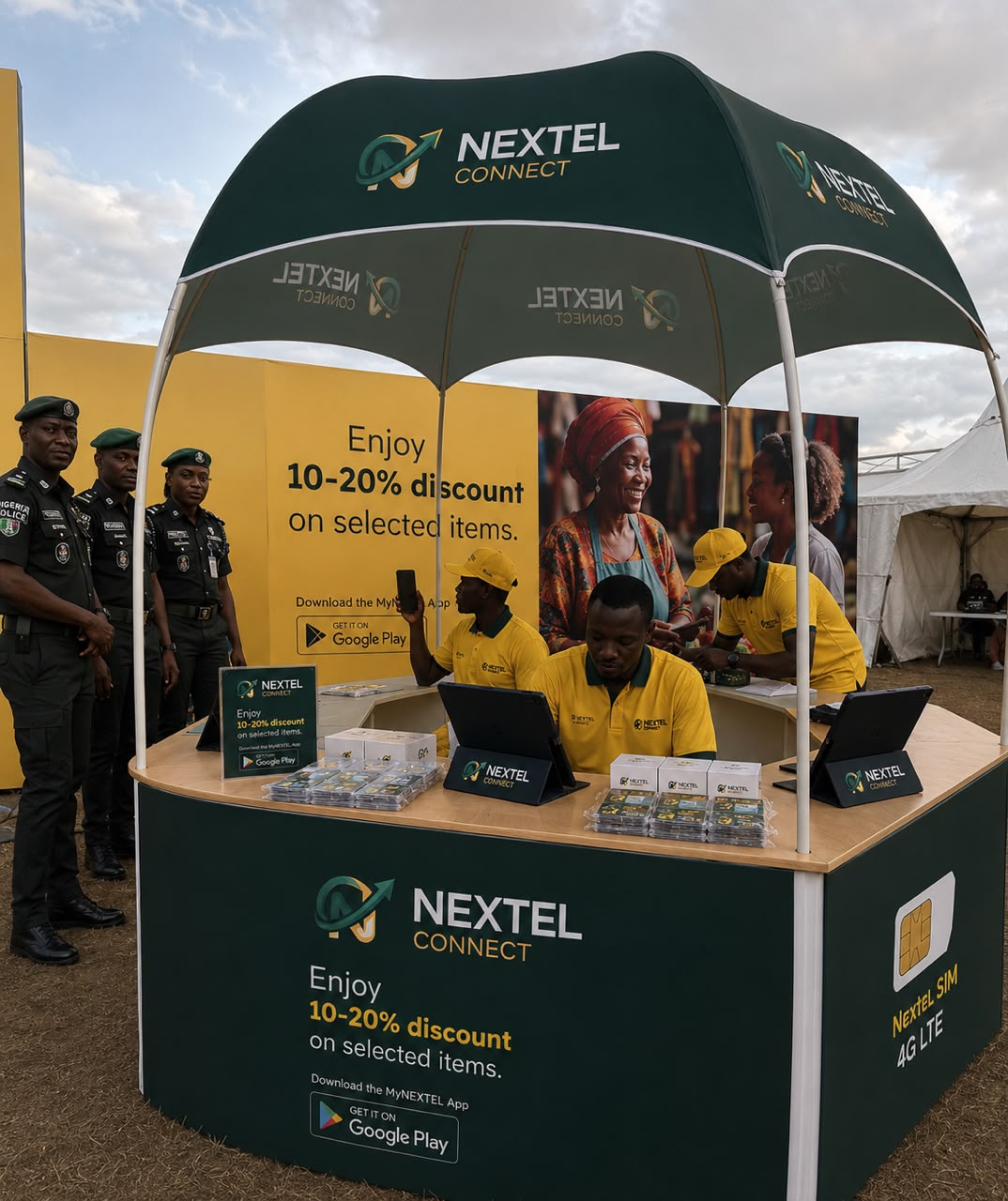 Nextel Connect SIM activation booth with staff at a Nigerian event